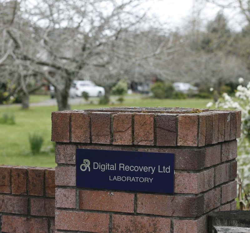 The plaque on the gate-post of the Digital Recovery data lab